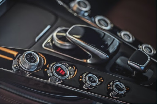 A modern handbrake with car controls around
