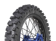 Close-up of the tread Deli Tire Maxi Grip SG1-R SB-156 120/90-18 65 R Front TT M/C FIM Enduro Competition